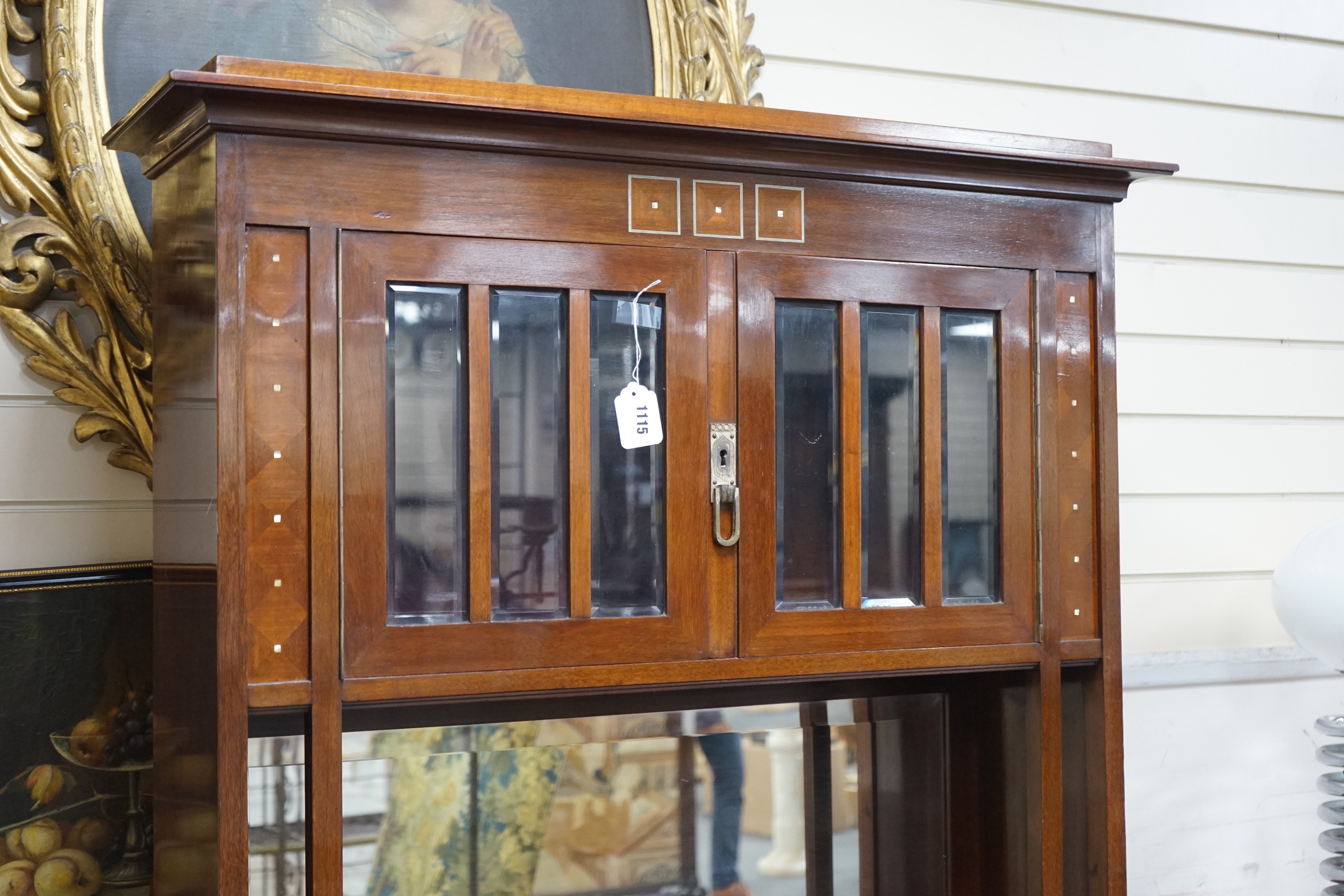 A Secessionist inlaid mahogany side cabinet